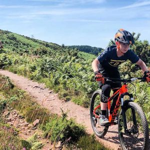 Exmoor-Adventures-kids-cycling-on-summers-day-300x300